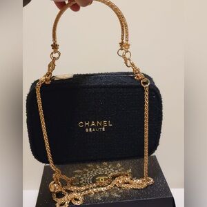 Chanel Black and Gold Cosmetic Bag